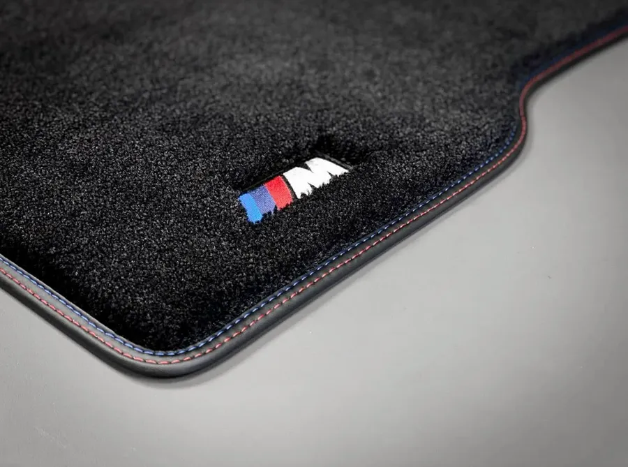 BMW M — premium pile, tri-colour edge stitching